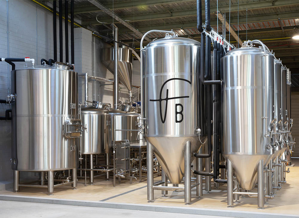 Why is the beer fermented under pressure in the fermenter?